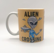 Listing image for Alien Crossing Ceramic Coffee Mug- UFO International Museum And Research Center