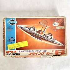 Listing image for Rare Vintage Kogure Flying Car 6 Rainbow Series UFO Plastic Wind-Up Model Kit JP